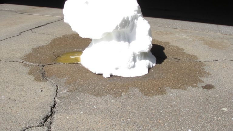 alkali dissolves oil stains