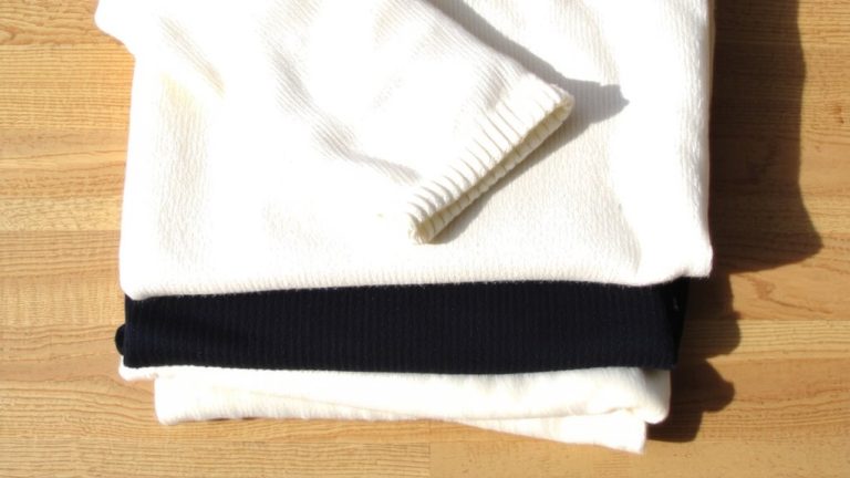 fold sweaters space efficiently