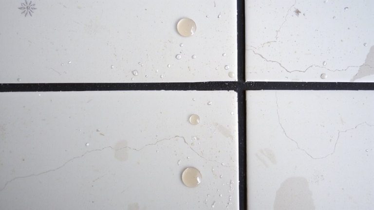 porous grout absorbs stains