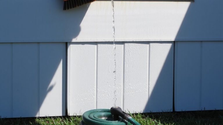 pressure wash gently with detergent